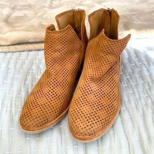 Dolce Vita tan perforated booties.